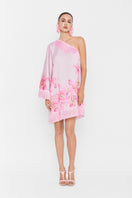 Pink Valenciani one-shoulder mini dress displayed on a hanger, showcasing its stylish design and vibrant color.