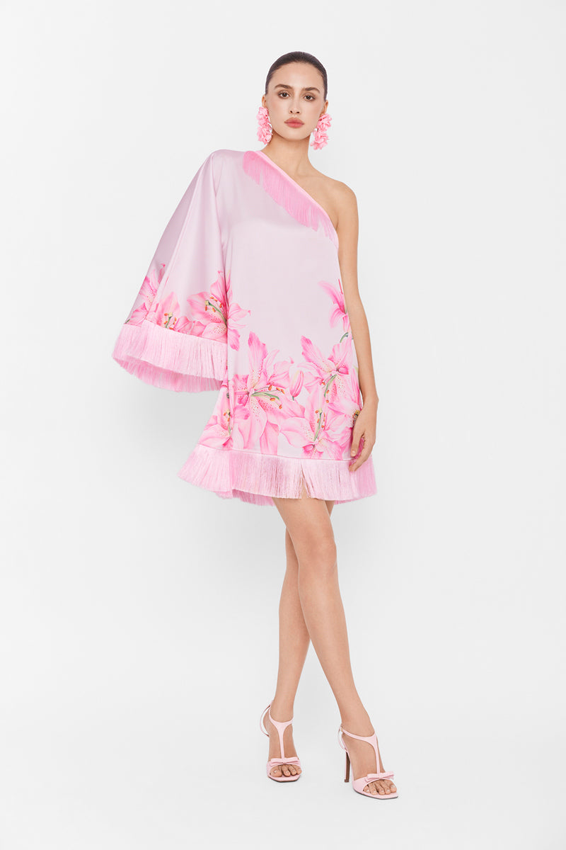 Pink Valenciani one-shoulder mini dress displayed on a hanger, showcasing the stylish neckline and vibrant color.
