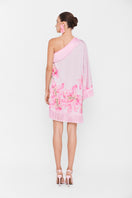 Pink Valenciani one-shoulder mini dress shown on a model, featuring a stylish asymmetrical neckline and fitted silhouette.