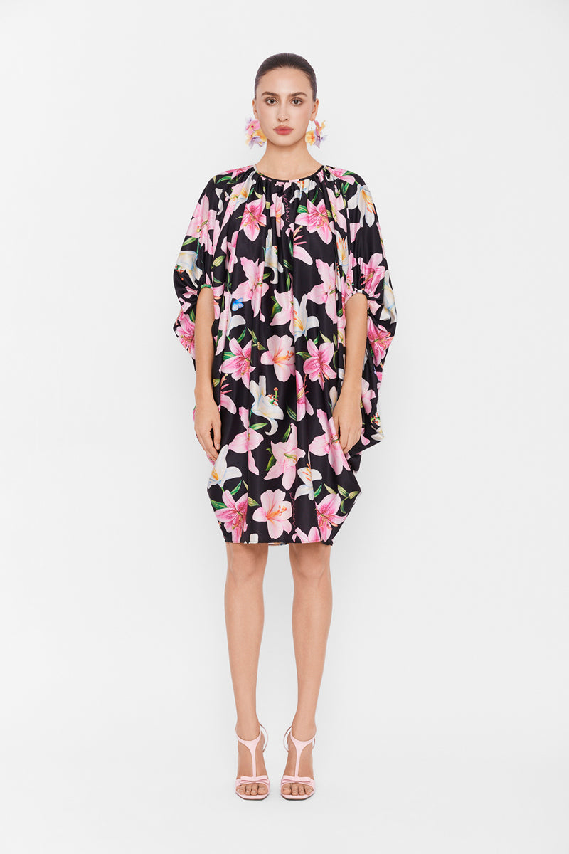 Multicolor balloon dress by Valenciani featuring a playful, flouncy mini dress with vibrant multicolor patterns.