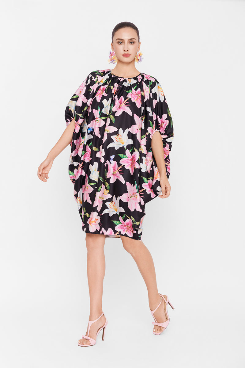 Multicolor balloon dress by Valenciani featuring a playful, vibrant mini dress design with a fitted waist and flowing skirt.