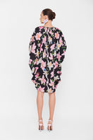 Black multicolor balloon dress by Valenciani, featuring a playful, voluminous mini dress design with bold color accents.