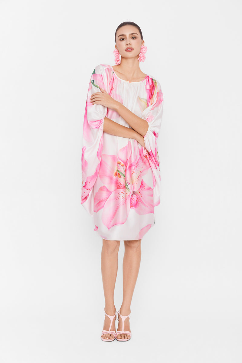 Multicolor balloon dress by Valenciani featuring a playful, vibrant mini dress with bold patterns and a fitted silhouette.