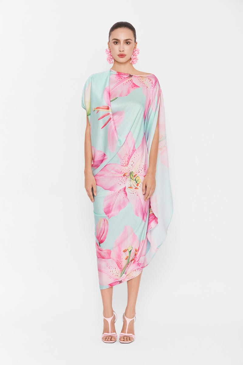 Multicolor asymmetrical drape maxi dress by Valenciani, featuring flowing fabric and stylish design, shown on a model.