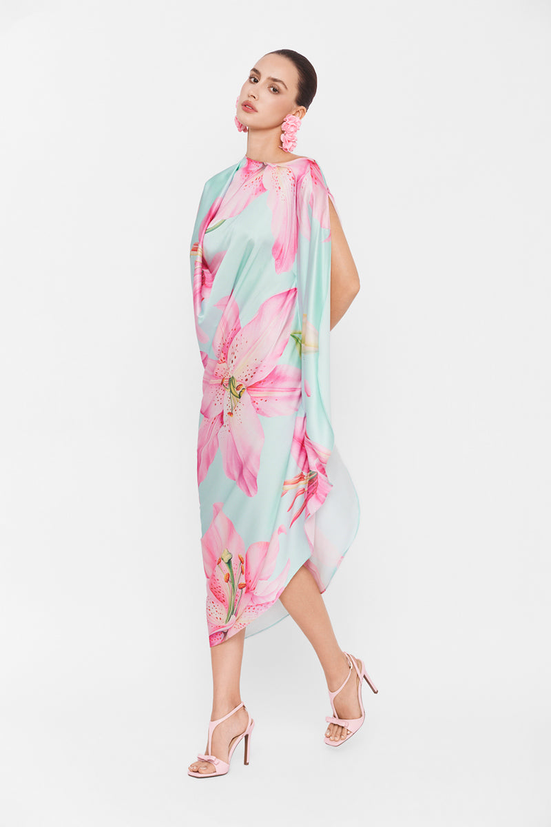 Multicolor asymmetrical drape maxi dress by Valenciani showcasing flowing fabric and stylish design.