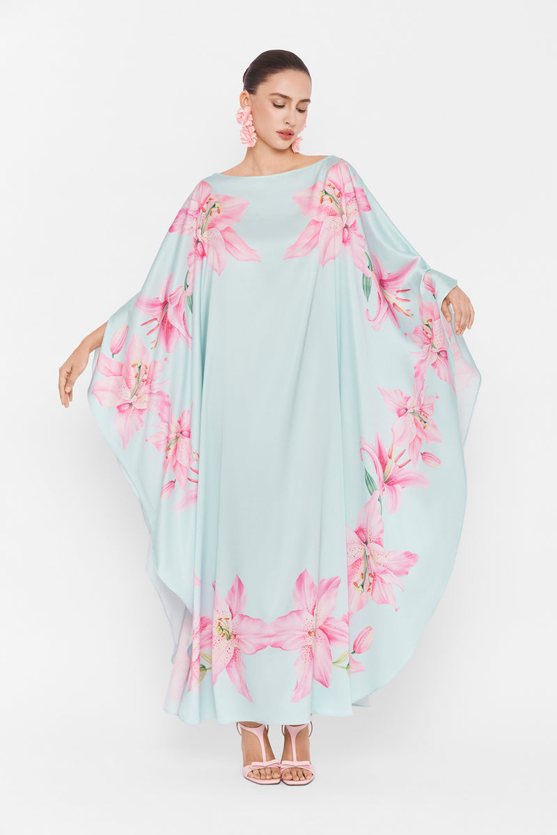 Colorful Valenciani Oasis Maxi Kaftan featuring vibrant multicolor patterns and flowing fabric, perfect for summer wear.