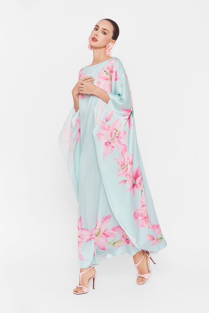 Colorful Valenciani Oasis Maxi Kaftan with flowing fabric and vibrant multicolor pattern, perfect for summer or beachwear.