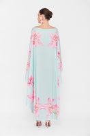 Multicolor Valenciani Oasis Maxi Kaftan featuring flowing fabric and vibrant patterns, perfect for summer or beachwear.