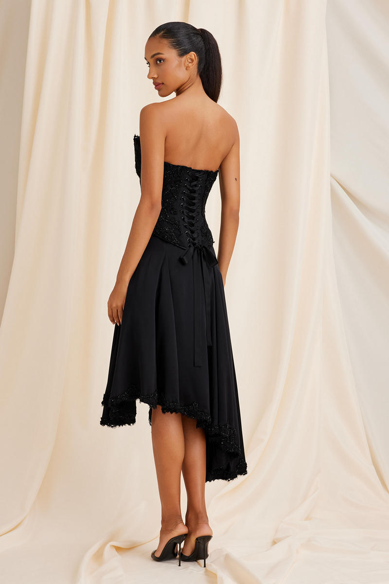 Black Lauren corset top by Scarlett Gasque, front view showing fitted design and lace-up details.