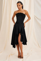 Black Lauren corset top by Scarlett Gasque, featuring structured design and intricate detailing, shown on a model.