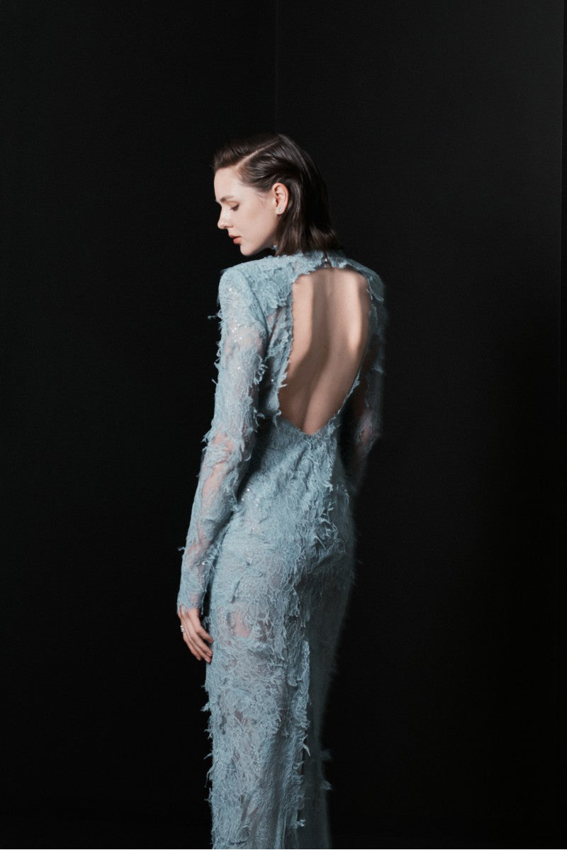 Blue Verona midi dress by LEKIEU, flowing fabric and elegant design, shown on a model.