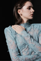 Blue Verona gown by Lekieu, elegant evening dress with flowing fabric and detailed design, showcased on a model.