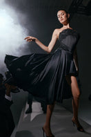 Black Lauren corset top by Scarlett Gasque, featuring structured design and lace-up details, shown on a model.