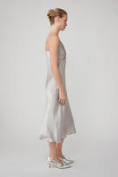 Silver MASTANI slip dress, midi length, featuring a sleek design and smooth fabric, perfect for elegant evening wear.