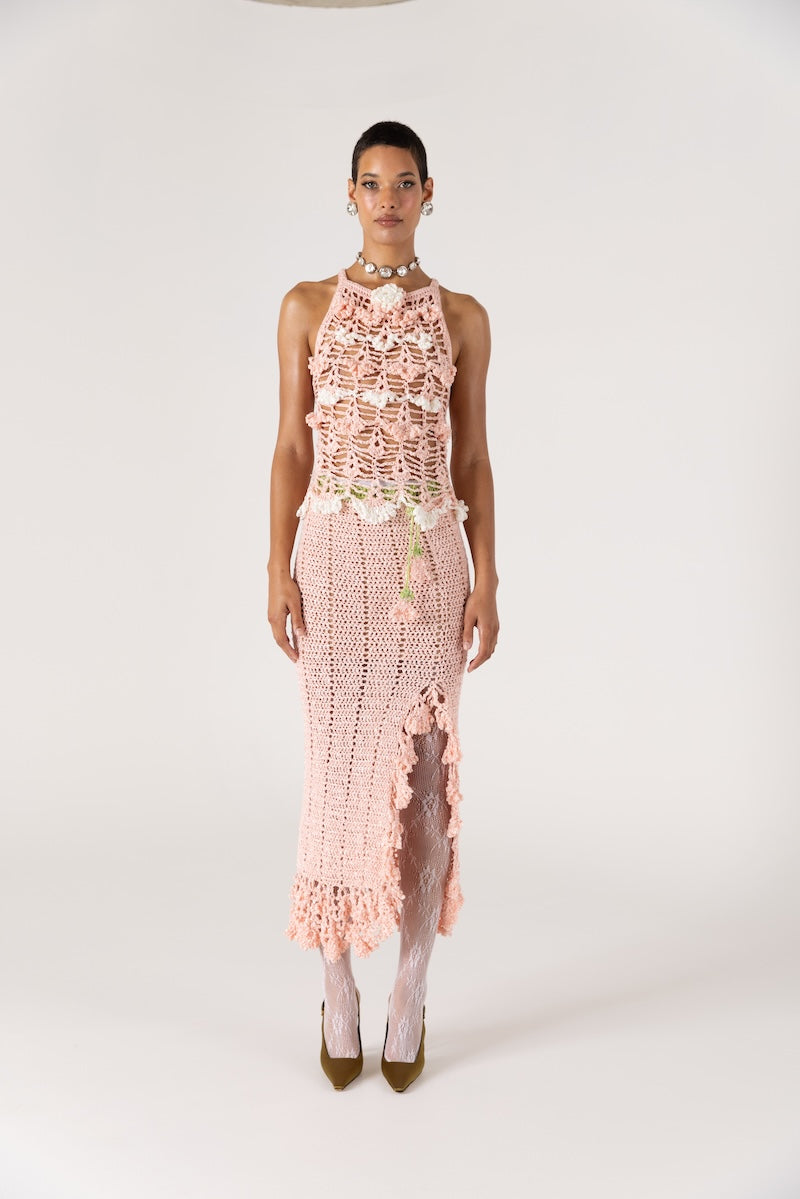 Pink handmade crochet top featuring intricate floral patterns from Andreeva's Chrysanthemum collection.