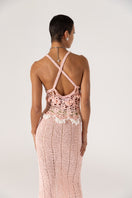 Pink handmade crochet top featuring chrysanthemum design by Andreeva, showcasing intricate knit details and feminine style.
