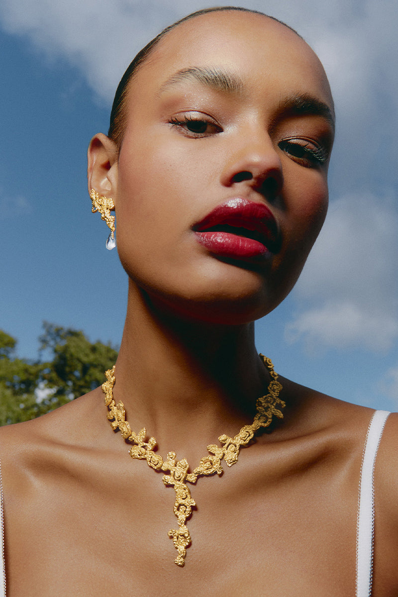 Jude Benhalim mini gold riverstone earrings featuring smooth, polished riverstone gemstones set in delicate gold earrings.
