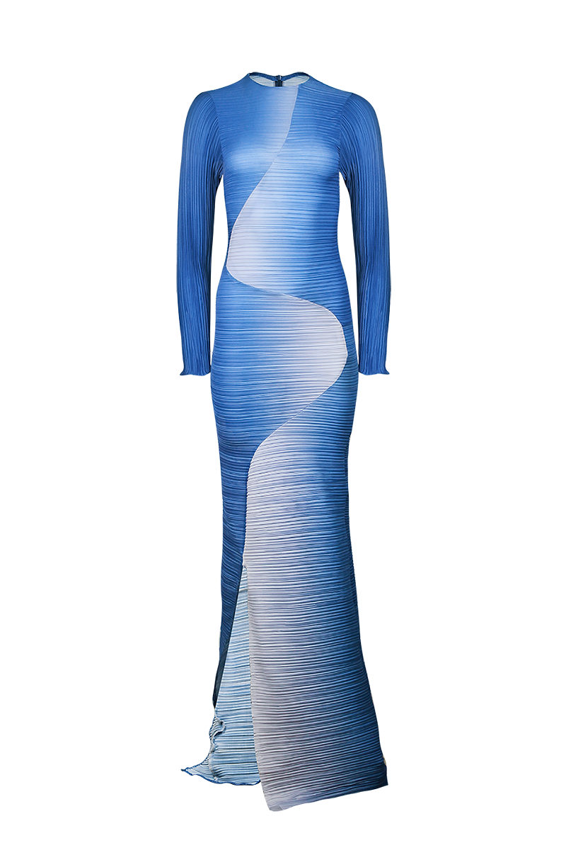 Maylé Vásquez NATIVA maxi dress displayed on a model, featuring flowing fabric and a stylish, elegant design.