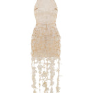Ivory Valenciani Thalassa halter maxi dress displayed on a model, featuring flowing fabric and elegant design.