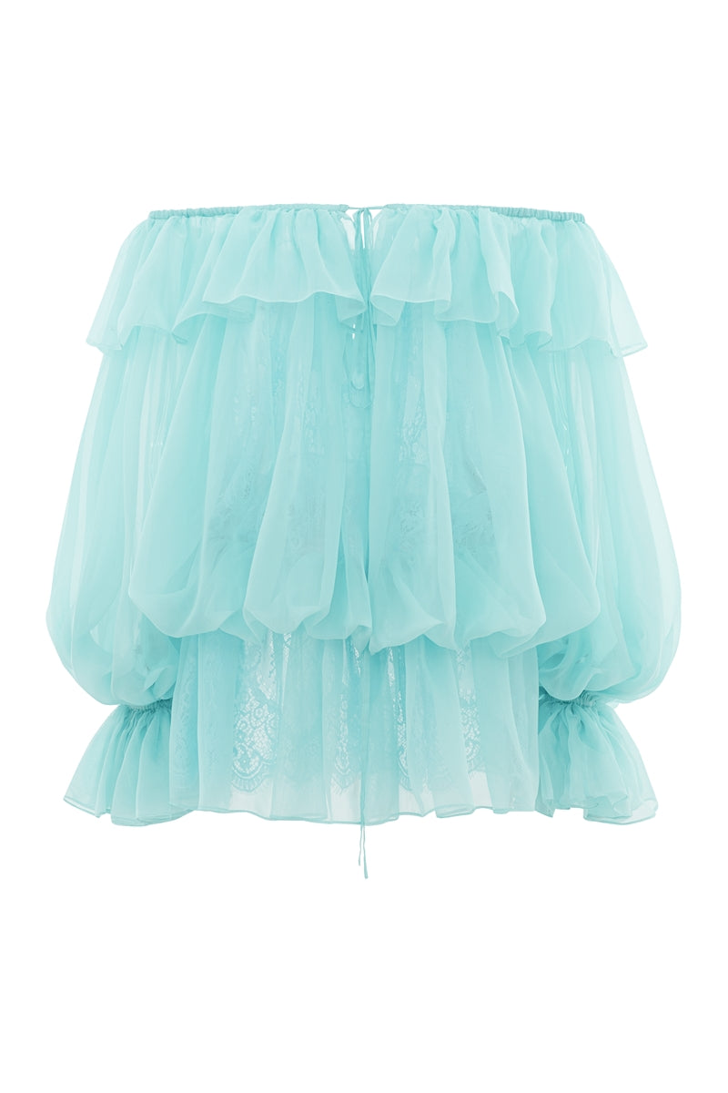 Turquoise off-shoulder mini dress styled as a scarf, by Valenciani, shown in a vibrant, flowing fabric with detailed draping.