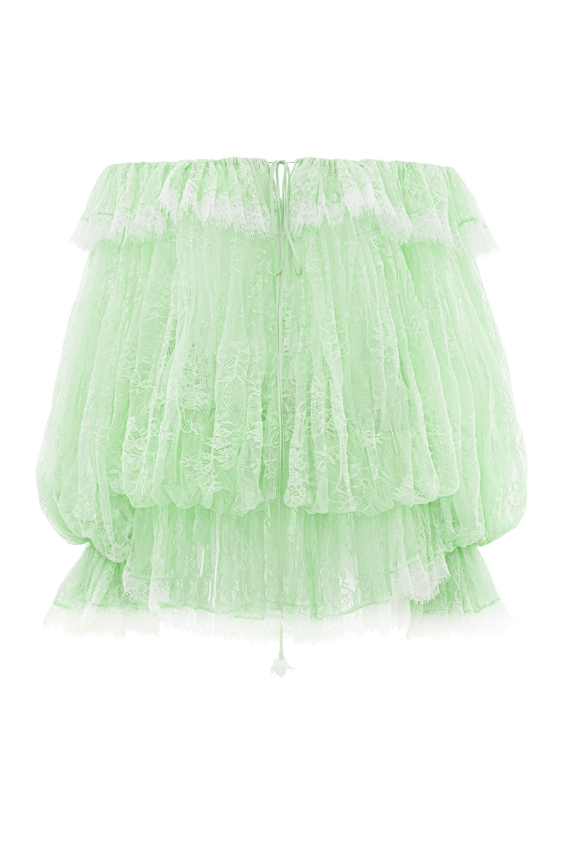 Valenciani off-shoulder lace mini dress displayed on a hanger, featuring delicate lace fabric and a stylish, fitted design.