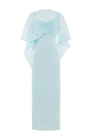Valenciani The Galatea Cape Gown in ice blue, a flowing maxi dress with cape detail, elegant and perfect for formal occasions.