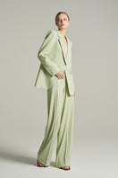 Mint green single-breasted blazer from I.H.F Studio, tailored fit, shown with wide-leg trousers in a professional outfit.