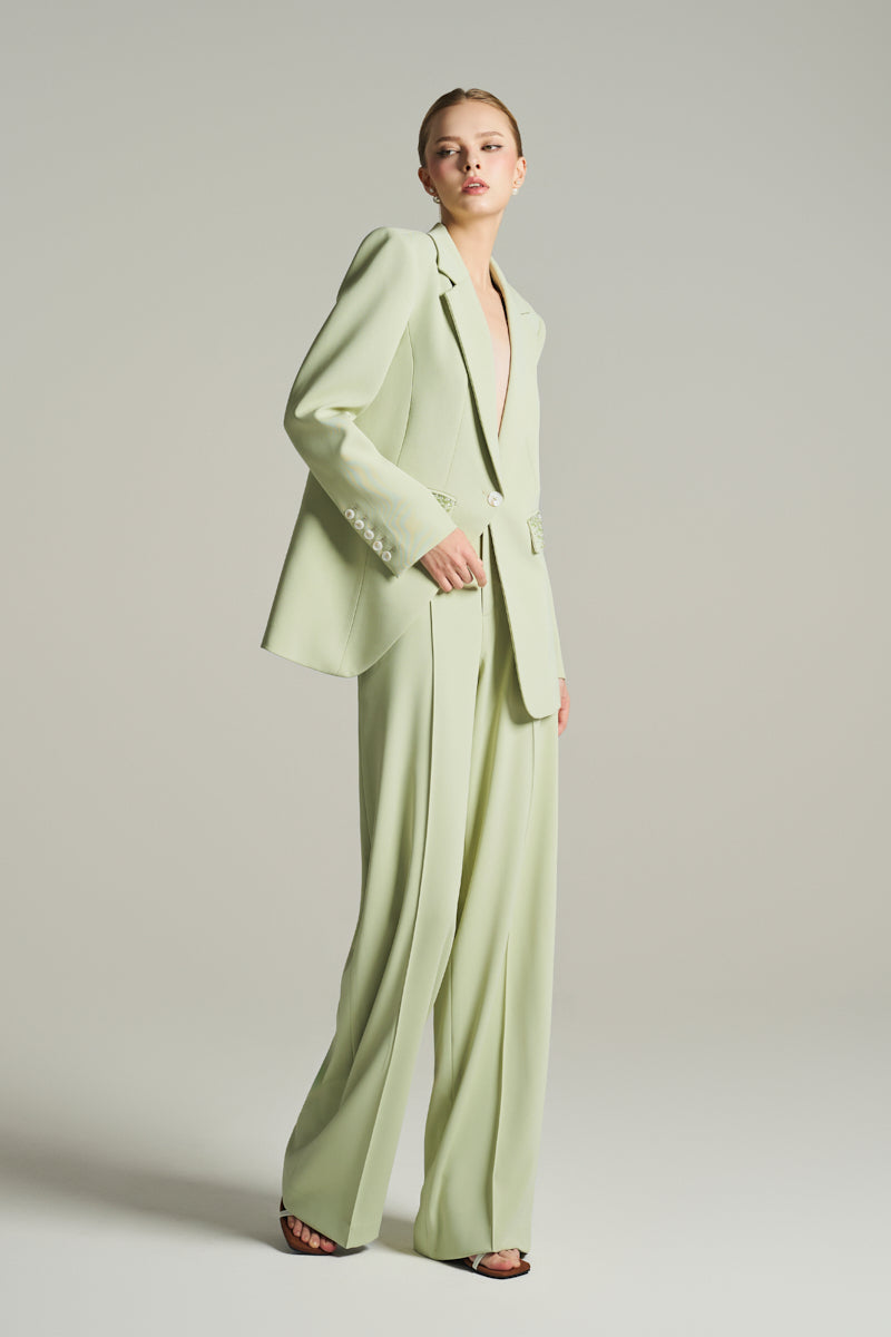 Mint green single-breasted blazer from I.H.F Studio, tailored fit, shown with wide-leg trousers in a professional outfit.