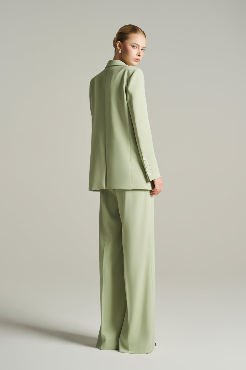 Mint single-breasted blazer from I.H.F Studio, tailored fit with clean lines, shown against a neutral background.