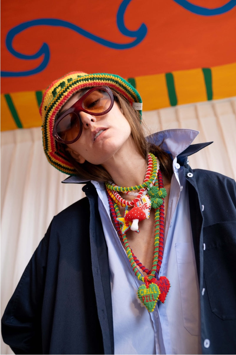 Red "Love You Long" necklace by Pájara Pinta featuring a delicate pendant on a fine chain.