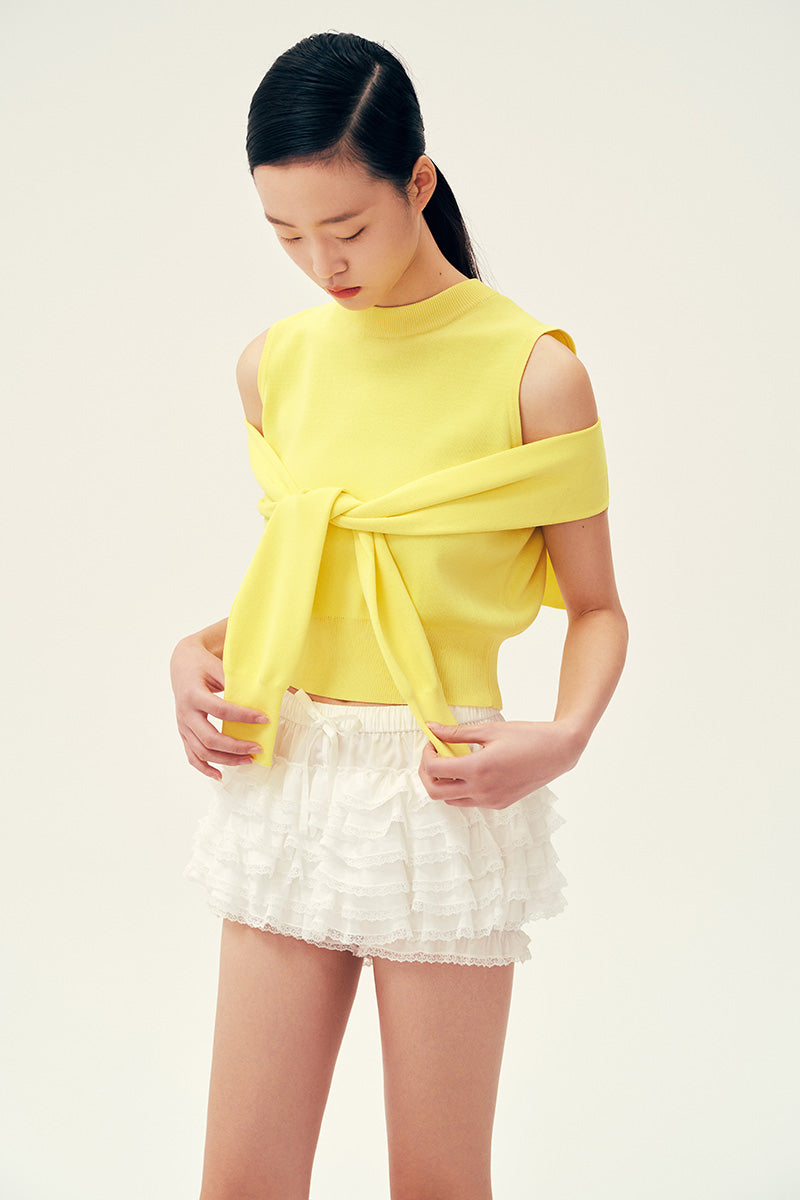 Chictopia Lola Ivory Shorts, lightweight casual shorts with a relaxed fit, displayed on a hanger with a plain background.