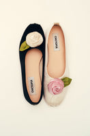 Chictopia satin rose flats in ivory with a delicate bow and floral design, perfect for elegant casual wear.