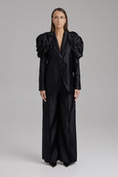 Black blazer from BAÉ's Rose Jet collection, featuring a tailored fit and sleek design, perfect for stylish outfits.
