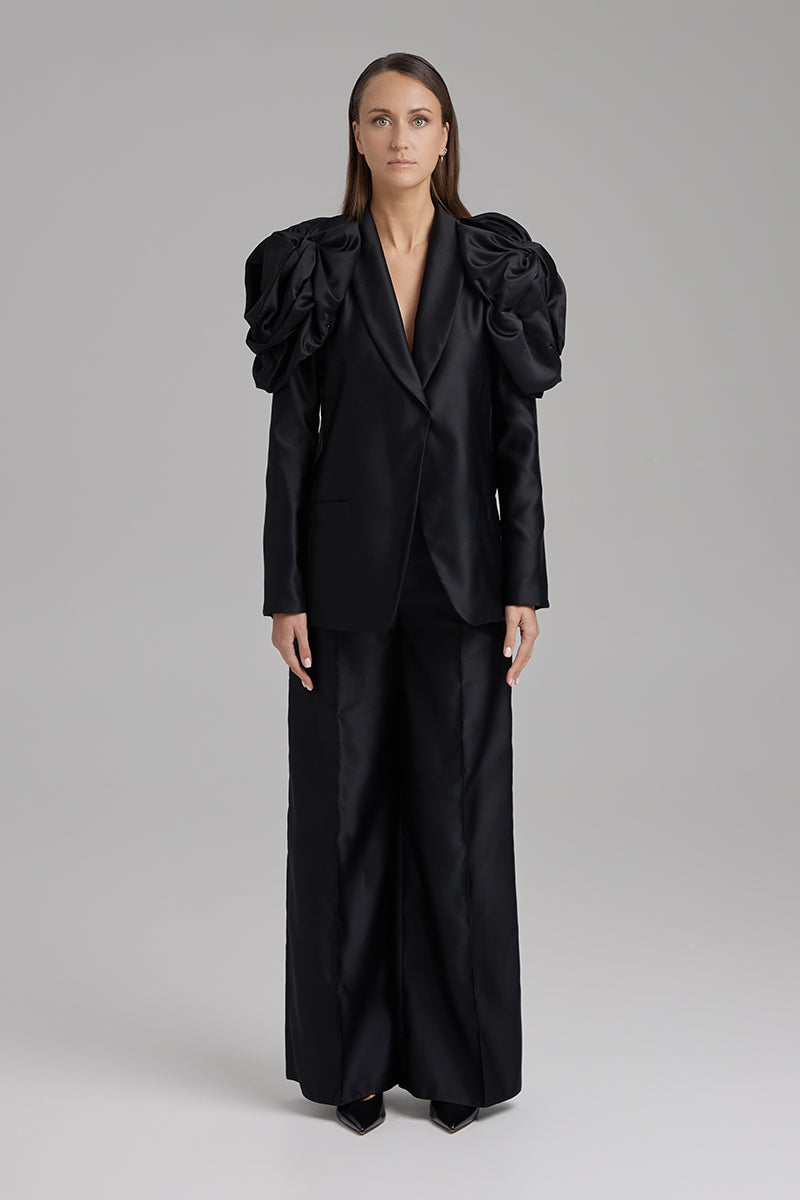 Black blazer from BAÉ's Rose Jet collection, featuring a tailored fit and sleek design, perfect for stylish outfits.