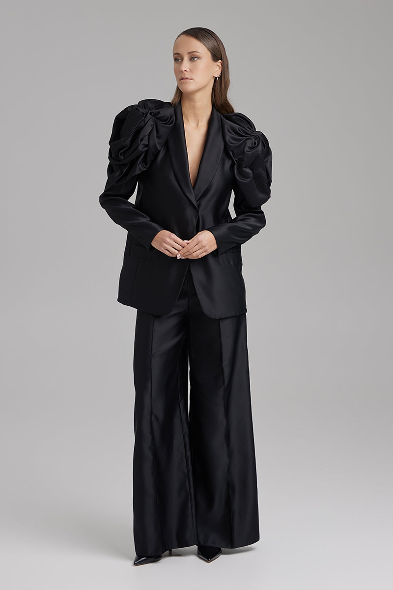 Black blazer from BAÉ's Rose Jet collection, tailored fit, with lapel collar and sleek design, suitable for formal or casual wear.