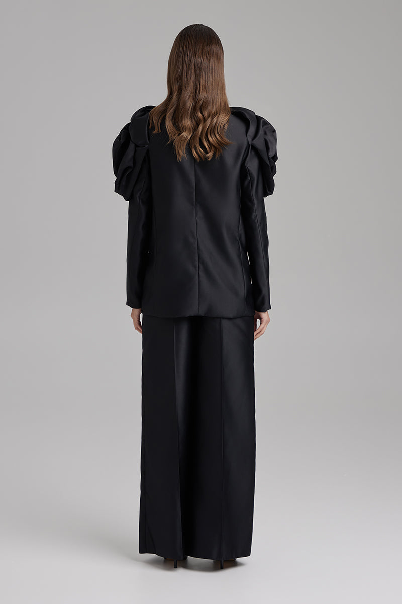 Black blazer by BAÉ, Rose Jet style, featuring a tailored fit, lapel collar, and sleek design for a sophisticated look.