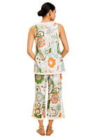 Back view of Mestiza New York Judah Cropped Pants in Groovy Florals, showcasing floral pattern and relaxed fit.