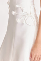 White corset A-line mini dress by Stolen Stores featuring fitted bodice and flared skirt, perfect for stylish occasions.