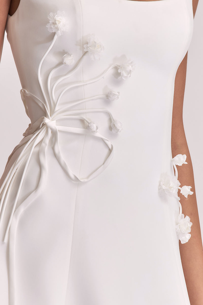 White corset A-line mini dress from Stolen Stores featuring a fitted bodice and stylish silhouette, perfect for casual and dressy occasions.