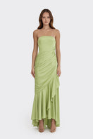 Green corset-draped maxi dress by Stolen Stores featuring a fitted bodice and flowing skirt, perfect for elegant occasions.