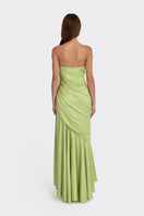 Green corset-draped maxi dress by Stolen Stores, featuring a fitted bodice and flowing skirt.