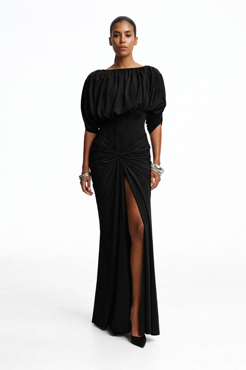 Black corset dress in a maxi style by Santa Brands, featuring fitted bodice and flowing skirt for elegant evening wear.