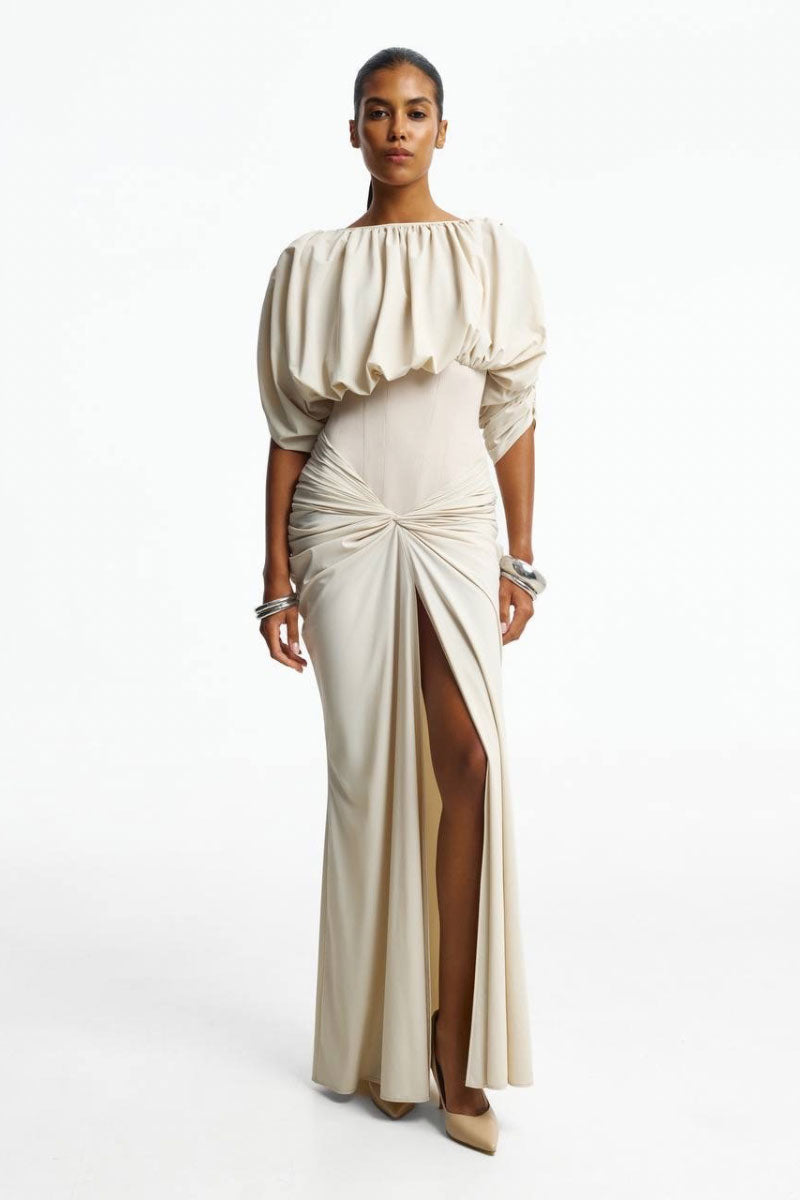 Ivory corset maxi dress from Santa Brands featuring a fitted bodice and flowing skirt, perfect for elegant occasions.