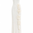 Off-white Costa Clara maxi dress by Maylé Vásquez, flowing fabric and elegant design, shown on a model.
