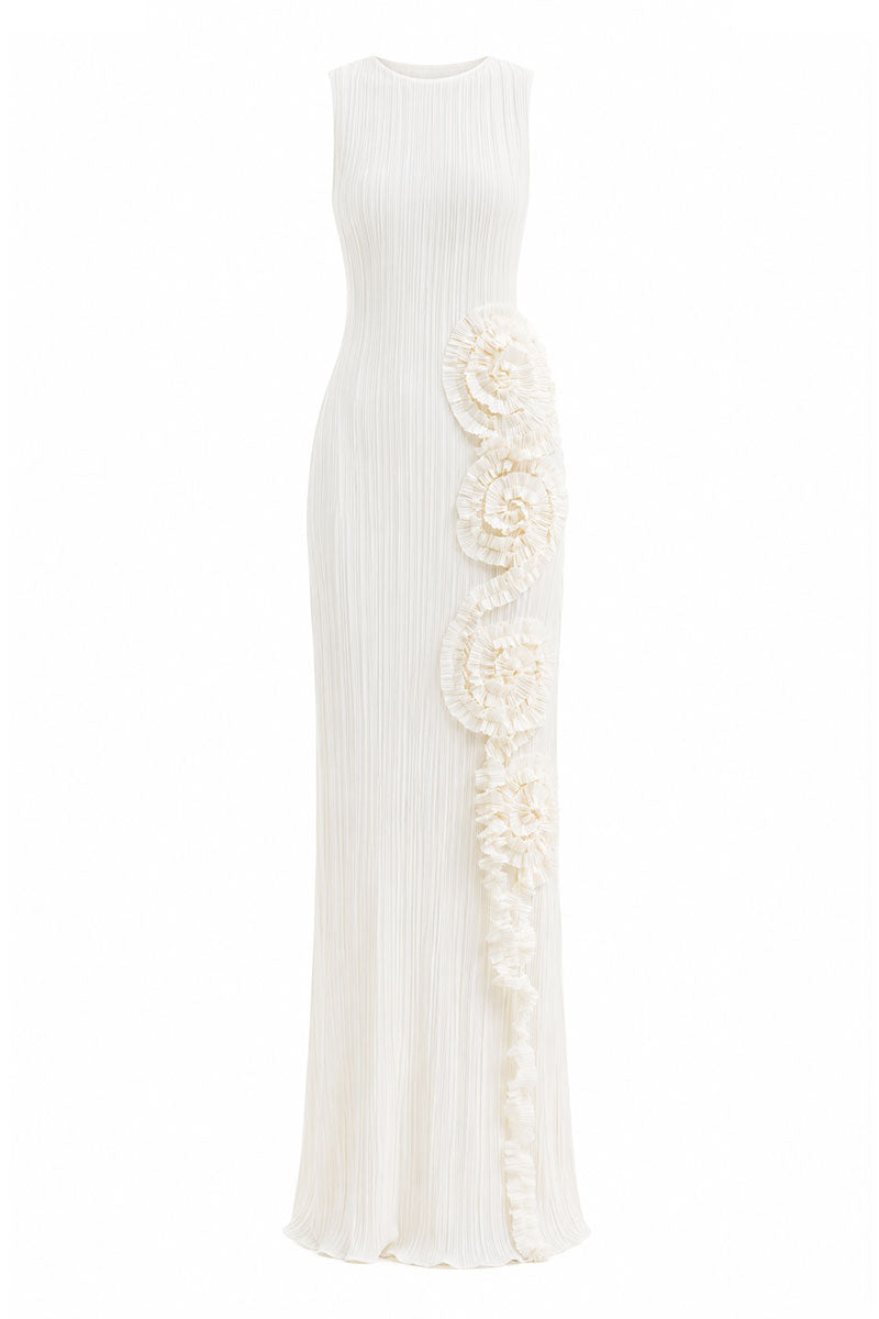 Off-white Costa Clara maxi dress by Maylé Vásquez, flowing fabric and elegant design, shown on a model.