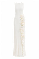 Off-white Costa Clara maxi dress by Maylé Vásquez, flowing fabric and elegant design, shown on a model.