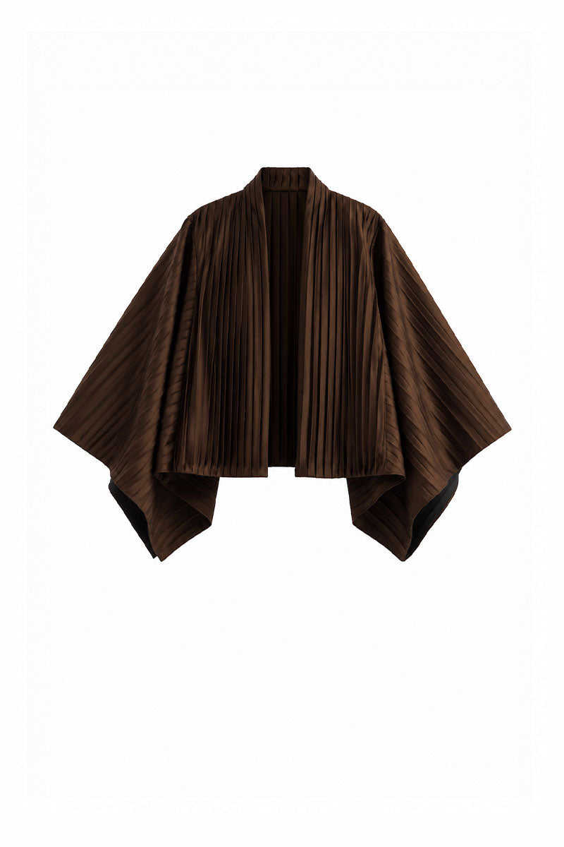 Brown COSTE NORTA jacket by Maylé Vásquez, shown in a stylish view, featuring a tailored design and modern jacket details.