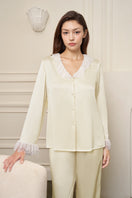 Yellow women's pajama set by MANITO featuring a comfortable, stylish design with a relaxed fit and soft fabric.
