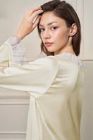Yellow women's pajama set by MANITO featuring a comfortable, casual design perfect for relaxing or sleeping.