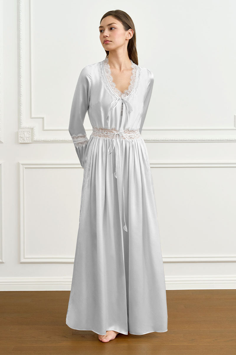 Gray women's silk robe by MANITO, elegant and smooth, shown hanging open with a relaxed fit and luxurious fabric.